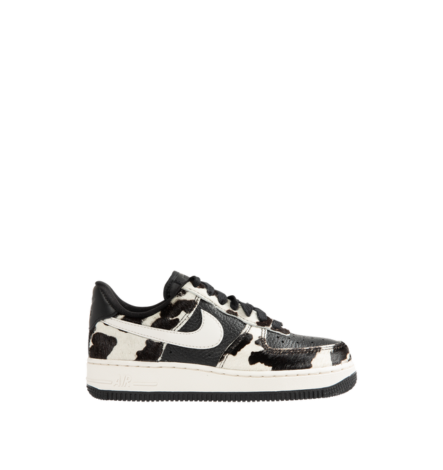 Image 1 of 5 - MULTI - Nike Womens Air Force 1 Low "Cow Print" Sneakers feature a leather upper with cow-print hair overlays. Designed with a lace-up closure, padded collar, perforated toe box, signature Nike Air cushioning, and durable rubber outsole. Upper: Leather with Cow-Print Overlays; Midsole: Nike Air Cushioning; Outsole: Rubber. Imported