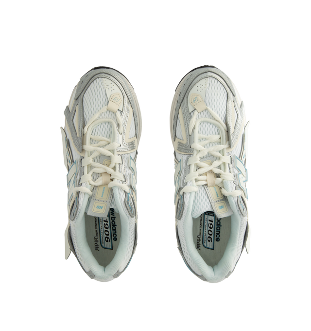 Image 5 of 5 - WHITE - New Balance 1906A Shoes feature a performance-inspired silhouette rooted in the brand's running heritage and equipped with advanced cushioning technologies for all-day comfort. Constructed with a breathable mesh upper, mesh underlays, and curvilinear synthetic overlays, this modern design offers a refined interpretation of early-2000s technical footwear. The sole unit combines ACTEVA LITE cushioning, ABZORB SBS heel pods, and an N-ergy outsole for responsive comfort and superior shock