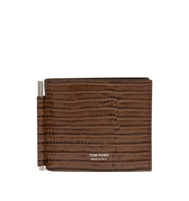 Image 1 of 3 - BROWN - Tom Ford T Line Soft Grain Leather Money Clip Wallet is crafted from soft grain calf leather and features the signature elongated T detail, an integrated money clip, and a compact bi-fold silhouette with multiple card slots for everyday organization. This designer leather money clip wallet combines refined craftsmanship with elevated functionality for daily use. Main Material: 100% Calf Leather. Lining: 70% Calf Leather, 30% Sheep Leather. Dimensions: 10.5 x 9 x 0.8 cm. Made in Italy.