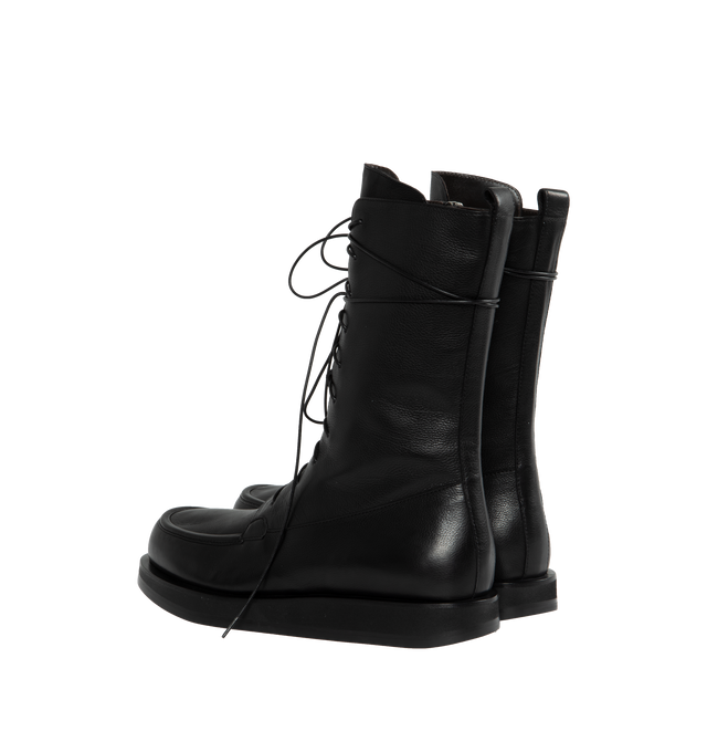 Image 3 of 4 - BLACK - THE ROW Patty Boot featuring vegetable tanned calfskin leather with lace-up front, stitched toe box and slim, supple shaft. 100% leather. Rubber sole. Made in Italy. 