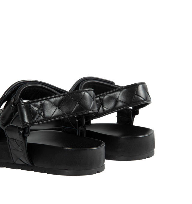 Image 3 of 4 - BLACK - BOTTEGA VENETA Leather Flat Sandals featuring ergonomic sculpted insole, round toe, VELCRO strap closure and signature intrecciato woven-pattern upper. Leather upper and lining, synthetic sole. Made in Italy. 