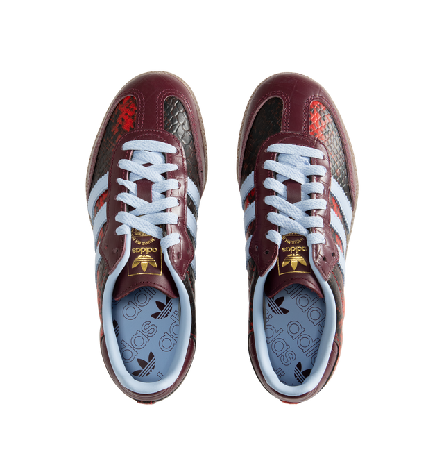 Image 5 of 5 - RED - Adidas Women's Samba OG Shoes reinterpret the brands iconic soccer-inspired silhouette with premium leather construction and heritage detailing. Designed with a lace-up closure and the signature elongated tongue, this updated version pairs classic Samba styling with modern versatility. Metallic Samba branding and Trefoil detailing celebrate the legacy of adidas Originals, while the durable rubber outsole provides reliable traction for everyday wear. Main Material: Leather. Closure: Lace