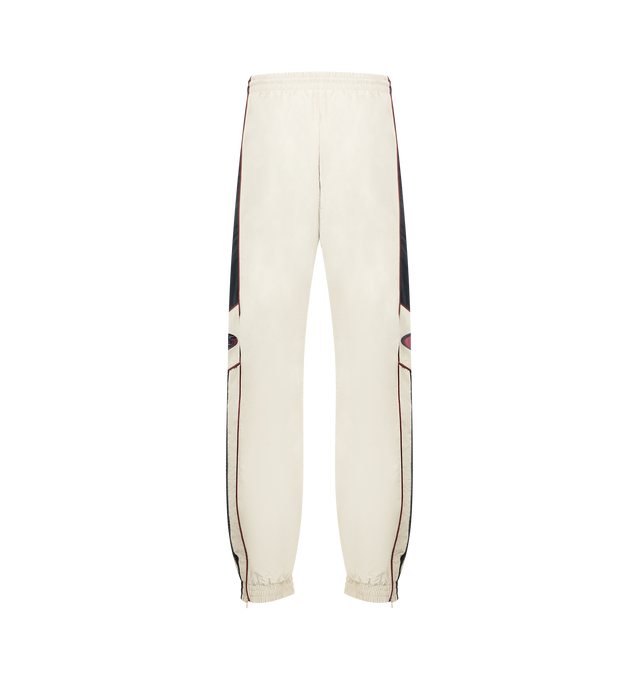 Image 2 of 3 - WHITE - MARTINE ROSE Hockey Trackpants featuring side stripe detailing, logo print, elasticated ankles, side pockets, panelled design and elasticated waistband. 100% polyamide.