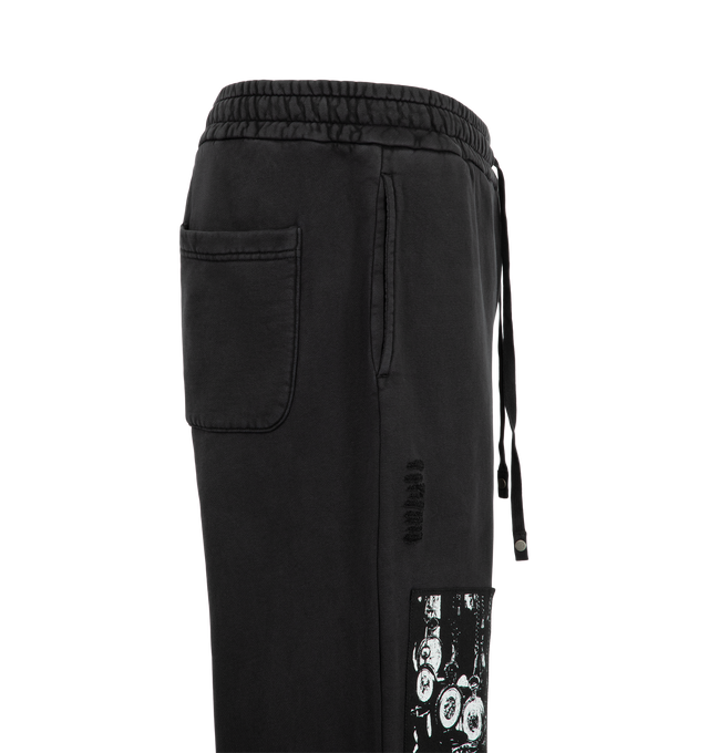 Image 3 of 3 - BLACK - Midnight Rodeo Opera House Sweatpants are crafted from heavyweight cotton and feature a flared wide-leg silhouette, a faded wash, subtle distressing, and emboidered patchwork designs on the front and back. Main Material: Heavyweight Cotton.