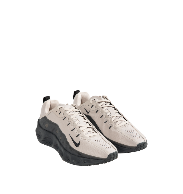 Image 2 of 5 - GREY - NIKE Ava Rover Sneaker featuring a stacked ReactX midsole, ultralight outsole, breathable upper, mudguards wrap around the lightweight upper to help you feel locked in, perforations on the top of the shoe enhance breathability, oversized midsole made with performance-level ReactX foam for ultra-comfortable cushioning, a thin layer of rubber on the outsole and reflective finish.