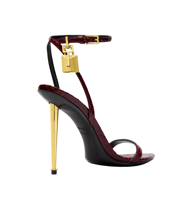 Image 3 of 4 - RED - TOM FORD Semi Shiny Printed Python Padlock Pointy Naked Sandal featuring a pointed toe, signature padlock hardware and a metal spike heel. 105 mm heel. 100% calfskin. Made in Italy.