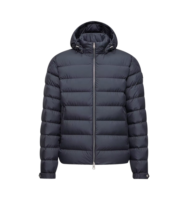 Image 1 of 1 - BLUE - Moncler Men's Arneb Hooded Short Down Jacket is crafted from lightweight, water-repellent Airsoft fabric and features a streamlined silhouette designed for everyday cold-weather wear. Down-filled for warmth, this short jacket is finished with a detachable hood with micro chic lining, a front zip closure with leather trim, zipped pockets, adjustable snap-button cuffs, and a signature leather logo patch. Main Material: 100% Polyester. Lining: 100% Polyester. Padding: 90% Down, 10% Feathe