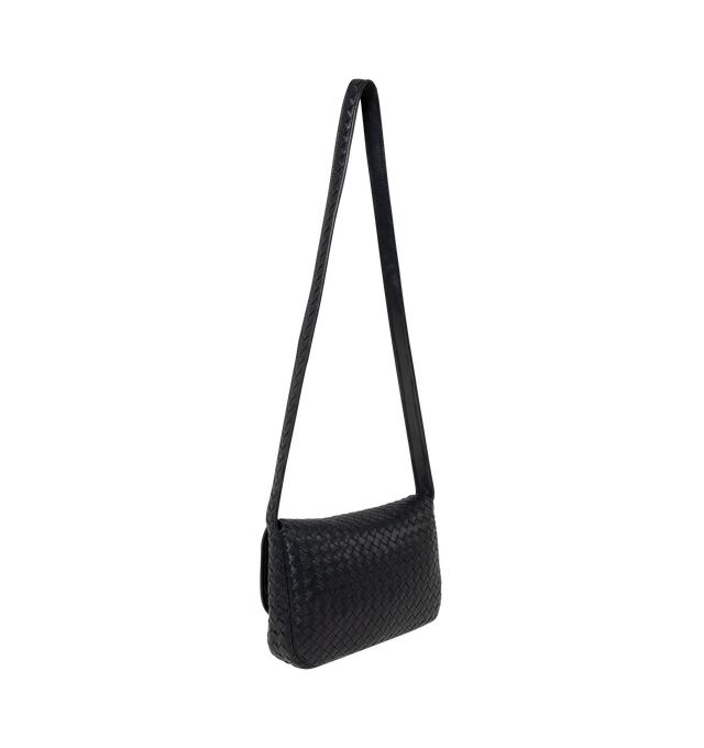 Image 2 of 3 - BLACK - Bottega Veneta Mens Veneto Messenger Bag is crafted from soft Intrecciato nappa leather. Features a rounded silhouette with flap closure, one interior zip pocket, one open pocket, suede lining, and silver-finish hardware. Main Material: Nappa Leather; Lining: Suede. Dimensions: 18.5 cm H x 26 cm W x 5 cm D (7.3" H x 10.2" W x 2"). Strap drop: 52 cm (20.5"). Made in Italy.