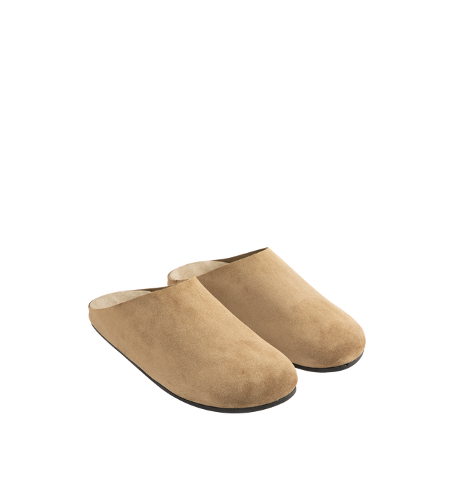 Image 2 of 4 - BROWN - THE ROW Hudson Slide in Suede featuring relaxed slip-on shoe in natural suede with round toe, contoured footbed, and rubber sole. 100% calfskin leather. Rubber sole. Made in Italy.