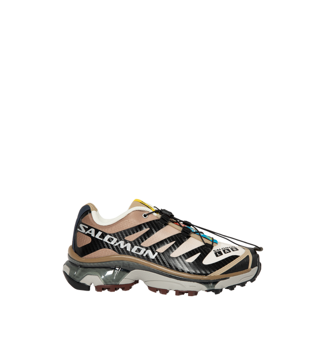 Image 1 of 5 - BROWN - Salomon Men's XT-4 OG Sneakers are crafted with a lightweight textile and synthetic upper and feature the brand's Agile Chassis System, Quicklace technology, and dual-density EVA cushioning for exceptional stability and comfort. Reviving one of Salomon's iconic trail-running silhouettes, these designer sneakers combine technical performance with archival outdoor style, delivering superior support, durability, and all-terrain traction for both city streets and rugged trails. Main Mater
