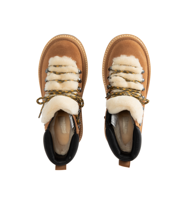 Image 4 of 4 - BROWN - UGG x sacai hiker boots designed for everyday wear, combines UGG's iconic premium  suede with sacai's unmistakable hybridized aesthetic. Upper is made with suede sourced from certified farms that practice regenerative agriculture upper. Midsole incorporates sugarcane EVA. Features Vibram XS Trek Evo. Unisex style in women's sizes.