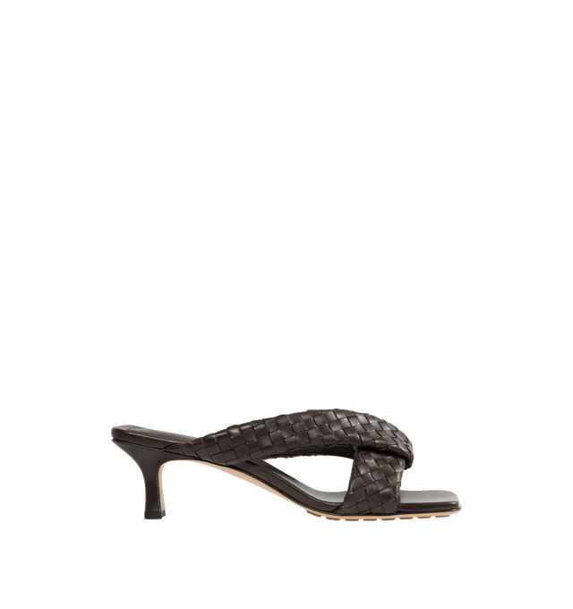 Image 1 of 4 - BLACK - BOTTEGA VENETA Riva Mule featuring kitten heel mule sandal in woven lambskin with padded tubular straps, twisted design and rubber-injected leather outsole. Heel: 2". Lambskin. Made in Italy.