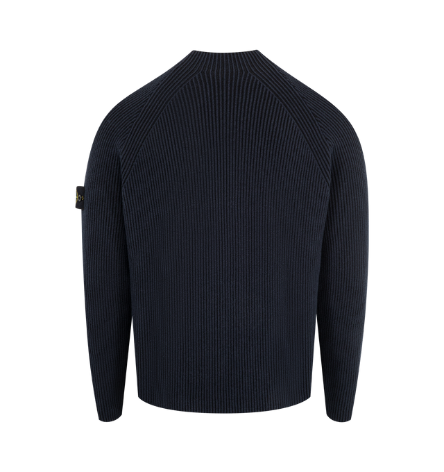 Image 2 of 3 - NAVY - STONE ISLAND Mock Neck Sweater featuring stitching along neckline, raglan sleeves, Stone Island badge on left sleeve, plain hem on cuffs and bottom and loose fit. 57% virgin wool, 35% cotton, 7% polyamide/nylon, 1% elastane/spandex.