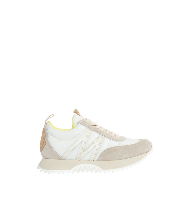 Image 1 of 5 - WHITE - MONCLER Pacey Low Top Sneakers featuring a bold logo and M-shaped accent, nylon technique and suede upper, mesh insole, lace closure, light TPU midsole and rubberized PU tread. 100% polyamide/nylon. Made in Italy. 