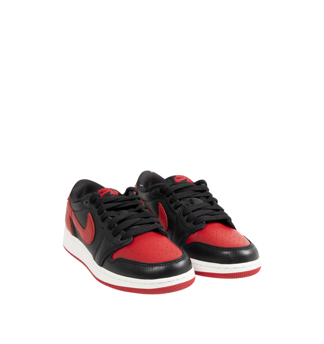 Image 2 of 5 - BLACK - JORDAN Air Jordan 1 Retro Low OG Sneaker featuring Nike Air technology, classic laces, leather upper, foam midsole and rubber outsole.