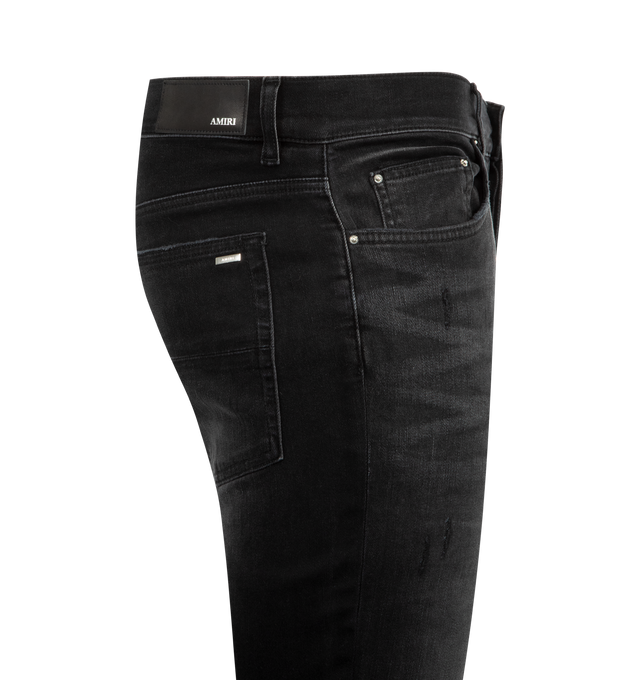 Image 3 of 3 - BLACK - AMIRI MX1 Ultrasuede Jeans featuring Italian stretch denim, hand-distressed and repaired with pleated suede, five-pocket detailing and zip fly with button closure. 92% cotton, 6% elastomultiester, 2% elastane. Made in the USA.