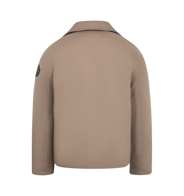 Image 2 of 3 - BROWN - CANADA GOOSE Lodge Coach Jacket featuring a pointed collar, packable into interior zip pocket, snap front closure, two exterior zippered pockets and two interior pockets: one drop-in pocket, one zippered security pocket. 100% nylon. Made in Canada.