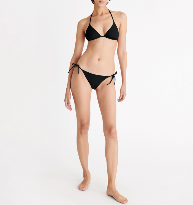 Image 3 of 6 - BLACK - ERES Malou Thin Bikini Brief Bottoms featuring side ties. Main: 84% Polyamid, 16% Spandex. Second: 68% Polyamid, 32% Spandex. Made in France. 