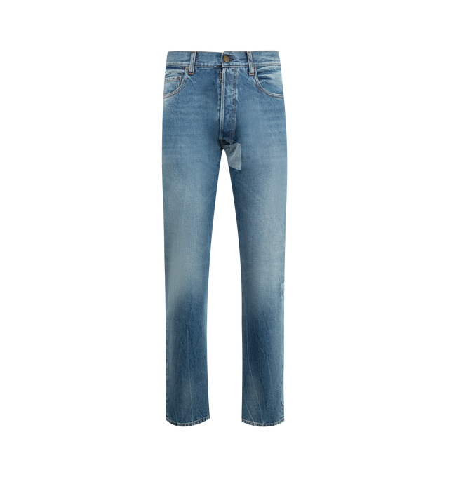 Image 1 of 3 - BLUE - MAISON MARGIELA Tapered Leg Jeans featuring a faded wash, rectangular patch and stitch detail at the upper thigh, straight leg and four stitches at the back. 100% cotton. Made in Italy.