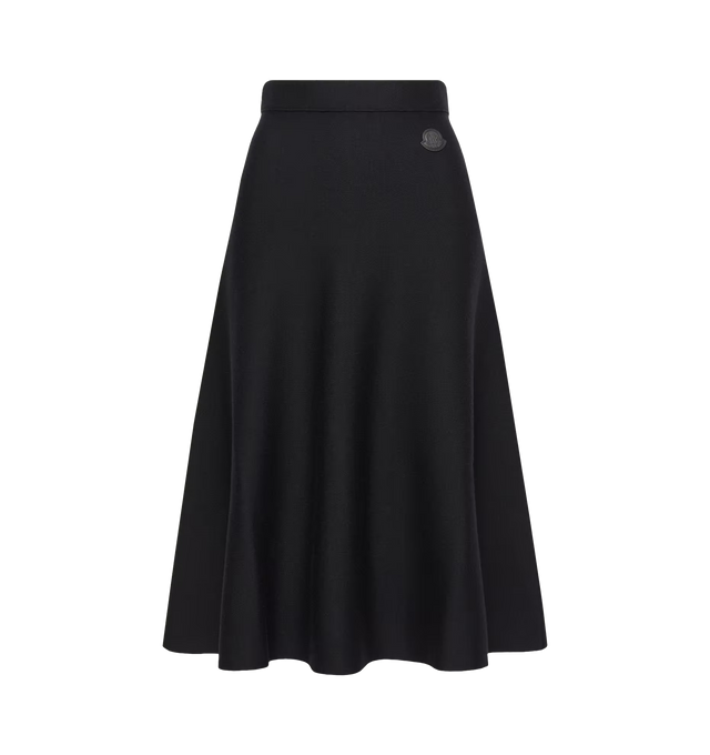 Image 1 of 1 - BLUE - Moncler Wool Blend Midi Skirt is crafted from a fine wool blend and detailed with a logo patch. Features a zipper closure with leather puller and detachable metal logo pin. Material: 50% Wool; 50% Acrylic, Leather Inserts: Lamb Leather. Made in Romania
