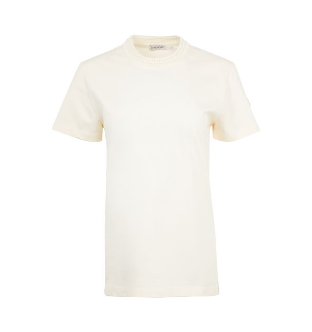 Image 1 of 3 - WHITE - MONCLER Crochet Accent Cotton T-Shirt featuring cotton jersey, crochet crew neck and short sleeves. 100% cotton. Made in Turkey.