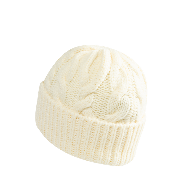 Image 2 of 2 - CREAM - Moncler Grenoble Women's Wool Blend Cable Knit Hat is crafted from a wool blend and features a classic cable-knit construction inspired by alpine textures. Designed as a timeless cold-weather accessory, this beanie is finished with a folded rib-knit cuff and a Moncler Grenoble logo patch at the front. Main Material: Wool Blend.