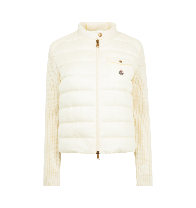 Image 1 of 3 - WHITE - MONCLER Padded Wool Zip-Up Cardigan featuring Merino wool, longue saison lining, down-filled longue saison front and collar, purl stitch and rib knit, gauge 5, zipper and snap button closure, zipped pockets, chest pocket with snap button closure and hem with drawstring fastening. 100% polyamide/nylon. 90% virgin wool, 10% cashmere. Padding: 90% down, 10% feather. Made in Turkey.