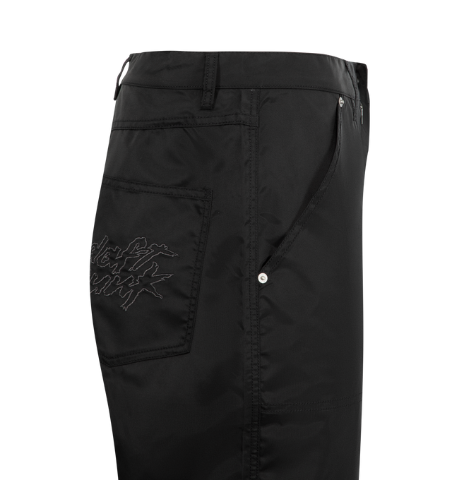 Image 3 of 3 - BLACK - PLEASURES X DAFT PUNK Helmets Nylon Work Pants featuring a zip-fly with button closure, 4-pocket design, two additional pockets towards the bottom of the legs and intricate embroidered helmet graphics on the front and a Daft Punk logo on the back. 100% nylon aviator flight satin.