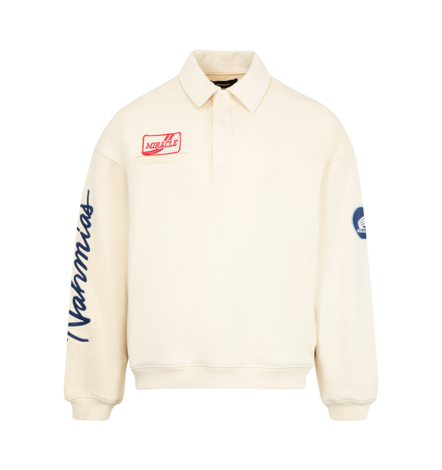 Image 1 of 4 - WHITE - NAHMIAS Polo Henley Shirt featuring long sleeves, half button collar, novelty patches at front chest and sleeves, logo embroidery on sleeve and ribbed cuffs and hem. 100% cotton.