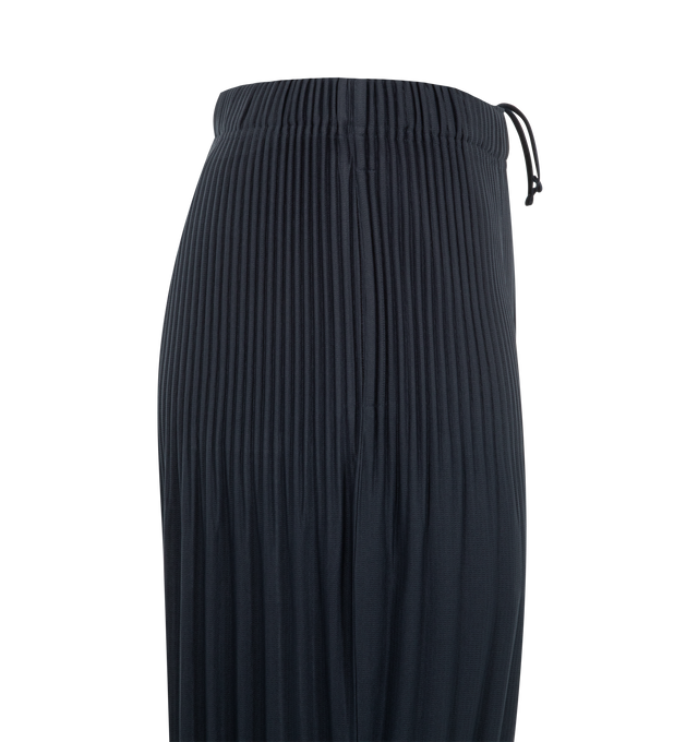 Image 3 of 3 - NAVY - ISSEY MIYAKE Tailored Pleats 2 Shorts featuring pleated throughout, portability and lightweight comfort, quick-drying properties, shorter length, pockets on both sides, a drawstring waist and a button-fly design. 100% polyester.