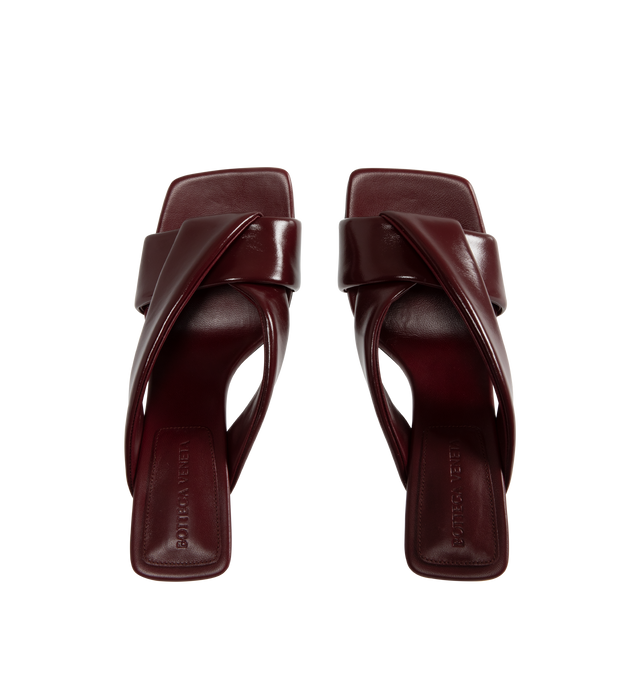 Image 4 of 4 - RED - BOTTEGA VENETA Riva Mule featuring shiny calfskin with padded tubular straps, twisted design and rubber injected leather outsole. Calfskin. Lining: lambskin. Heel: 3.5. Made in Italy.
