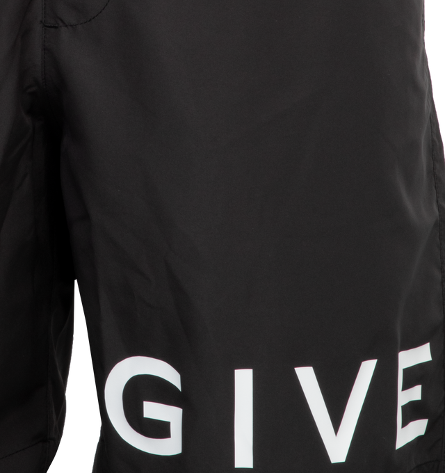 Image 6 of 6 - BLACK - GIVENCHY 4G NYLON LONG SWIMWEAR are made with recycled nylon with Givenchy 4G contrasted print, two side pockets, one back welt pocket and elastic waist. 100% polyester. Lining: 100% polyester. 
