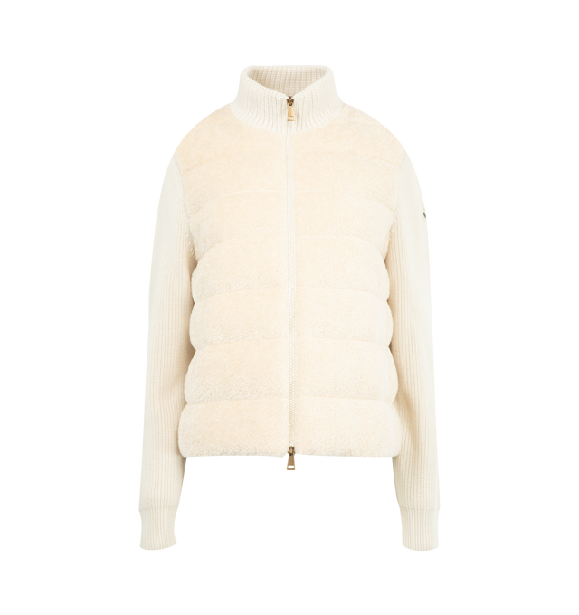 Image 1 of 3 - WHITE - MONCLER Padded Teddy & Wool Zip-Up Cardigan featuring ultra-fine Merino wool, teddy fleece front and back, longue saison lining, down-filled, high neck, ribbed knit, gauge 7 and 5, zipper closure and zipped pockets. 60% acrylic, 40% cotton. 100% virgin wool. Lining: 100% polyamide/nylon. Padding: 90% down, 10% feather. Made in Moldova.