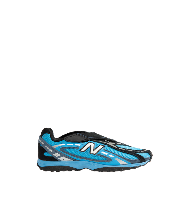Image 1 of 5 - RED - New Balance Unisex 204V Sneakers feature a low-profile silhouette in Neo Flame, Black, and Black Cement, combining premium suede and textile materials in a multi-piece upper with embossed overlays. Screen-printed graphics along the saddle and a molded "N" logo complete the design, while an alternative strap closure provides easy access and an adjustable fit. Upper: Suede and Textile. Midsole: EVA. Closure: Adjustable Strap. *Unisex style in men's sizing.