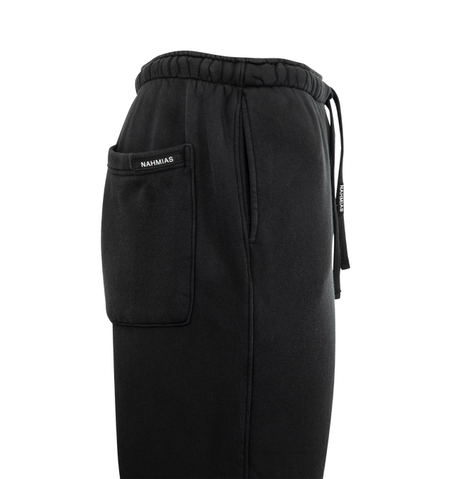Image 3 of 3 - BLACK - NAHMIAS Mascot Wide Sweatpant featuring wide leg, elastic waist with drawstring, bungee cord at hem and mascot motif printed on front. 100% cotton.