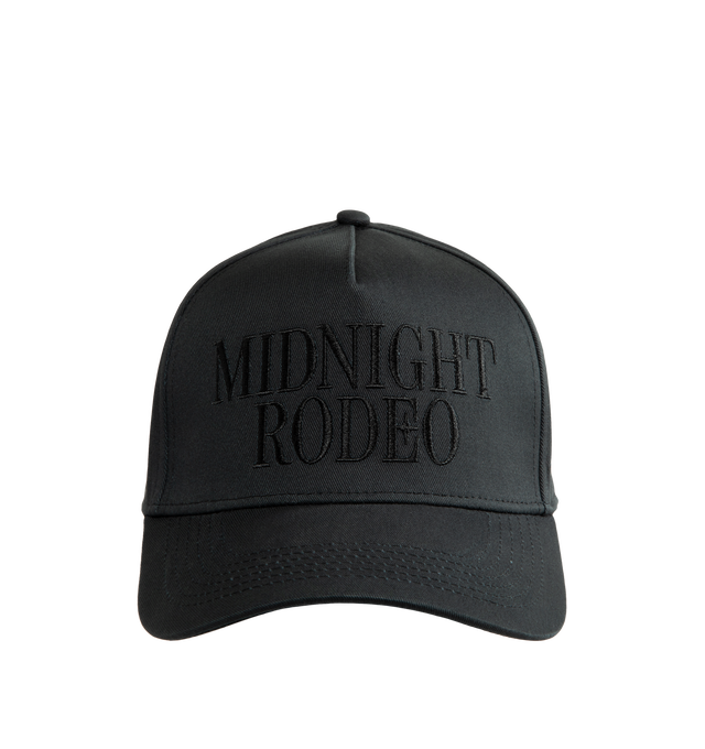 Image 1 of 3 - BLACK - Midnight Rodeo Blackout "Classic" Trucker Hat is crafted from cotton twill and features the brand's signature Midnight Rodeo logo embroidered at the front, "You're Not Dreaming" embroidery at the side panel, and an MR logo embroidered at the back. Designed with an adjustable fit and detailed embroidery throughout, this classic trucker-style cap is finished with a custom lining featuring Midnight Rodeo branding. Main Material: Cotton Twill.