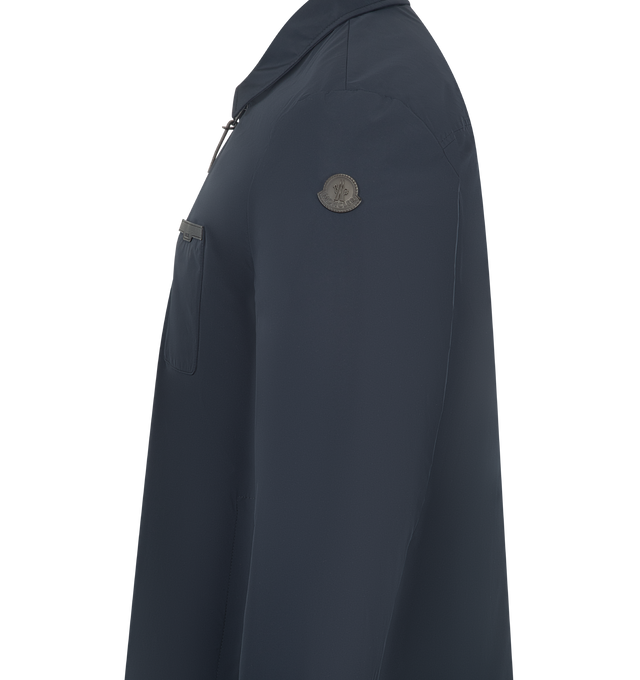 Image 3 of 3 - NAVY - MONCLER Tollymore Down Shirt Jacket featuring water-repellent main fabric, Airsoft lining, down-filled, zipper closure, zipped pockets, chest pocket, inside pockets with snap button closure, inside fabric description label and leather logo pocket. 100% polyester. Padding: 90% down, 10% feather.