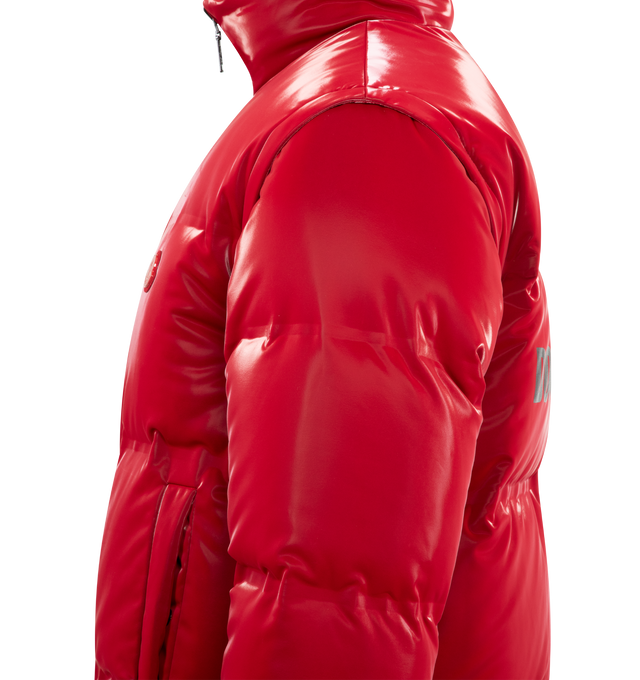 Image 3 of 4 - RED - Moncler x A$AP Rocky Throttle Reversible 2-in-1 Down Jacket featuring polyester jersey, nylon laqu lining, reversible, detachable sleeves, down-filled, zipper closure, pockets with button closure, logo print and logo patches. 95% polyester, 5% elastane/spandex. Lining: 100% polyamide/nylon. Padding: 90% down, 10% feather.