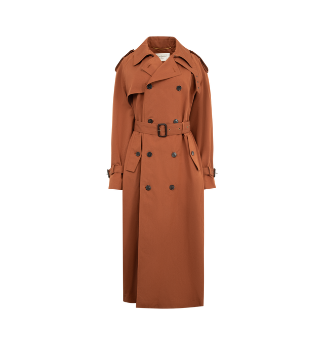 Image 1 of 3 - BROWN - SAINT LAURENT Trench Coat in water-repellent cotton and silk featuring oversized fit, double-breasted ten-button closure, adjustable and detachable belt, a three-way ulster collar and adjustable throat latch, storm flap, buttoned epaulets, strapped cuffs, two buttoned flap pockets at the front and silk lining. 89% cotton, 11% silk. Made in Italy.