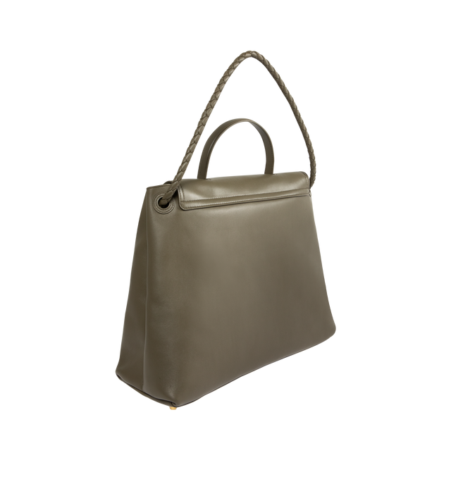Image 3 of 4 - GREEN - BOTTEGA VENETA Large Ciao Ciao Bag featuring top handle, silky calf leather with two-way flap and signature knot detail, a hidden hook closure, allowing the flap to be closed in the front or attached to the interior Intrecciato pocket, sliding shoulder carry strap, adjustable and detachable cross-body strap and compartmented interior with one zipped pocket. Calfskin. Lining: bonded suede. 32cm x 41.5cm x 14.5cm. Made in Italy.