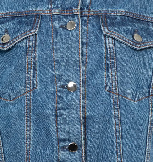 Image 3 of 3 - BLUE - TOTEME Classic Denim Jacket featuring a boxy silhouette finished with silver-tone buttons, flap and welt pockets, and a back monogram leather patch. 100% cotton organic. 