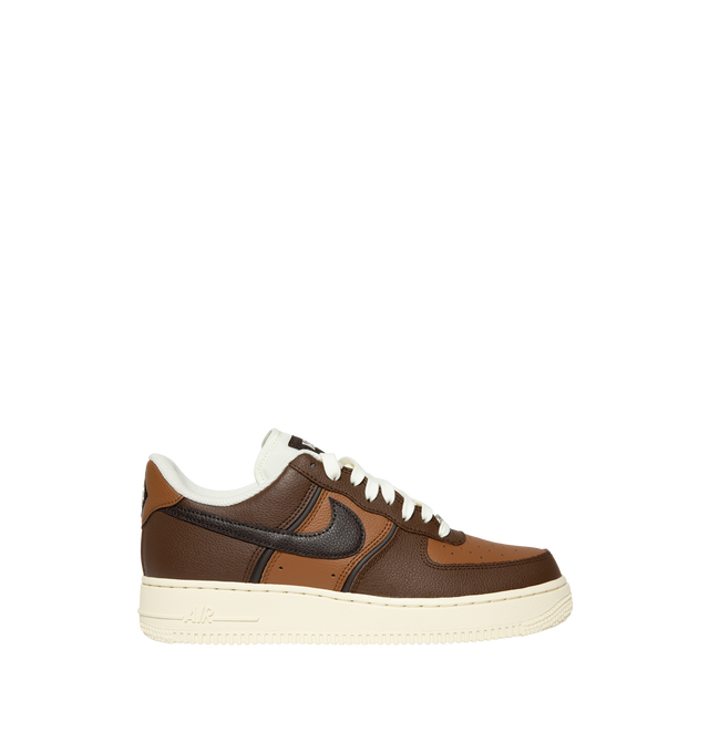 Image 1 of 5 - BROWN - Nike Men's Air Force 1 '07 LV8 Sneaker featuring classic silhouette with genuine and synthetic leather upper with perforated toe box, Nike Air unit, rubber outsole with classic pivot circles and padded collar.
