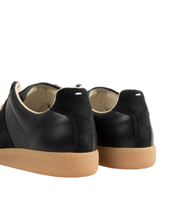 Image 3 of 5 - BLACK - Maison Margiela Replica Sneakers featuring lace-up sneakers in nappa leather and crust leather, contrasting sole, Maison Margiela logo label on the tab, internal Replica label, internal elastic and all-over Maison Margiela logo insole. 100% calf leather. Sole: 100% rubber. Made in Italy.