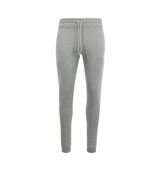 Image 1 of 3 - GREY - MONCLER Sweat Bottoms featuring cotton fleece, elastic waistband with drawstring fastening, side slant pockets and logo patch. 100% cotton.