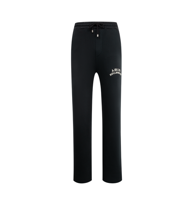 Image 1 of 3 - BLACK - AMIRI Hollywood Sweatpants featuring french terry, drawstring at elasticized waistband, two side pockets, back welt pocket and logo and text at front. 100% cotton. Made in Italy.