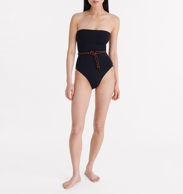 Image 2 of 5 - BLACK - ERES Majorette One-Piece Bustier Swimsuit featuring two-tone twisted belt to tie at the waist, gripper tape and side shirring. 84% Polyamid, 16% Spandex. Made in Morocco. 