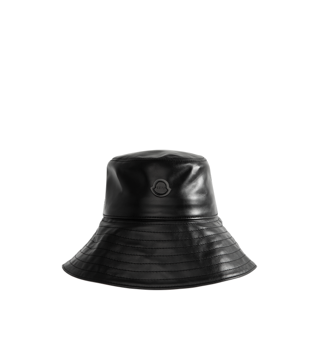 Image 1 of 2 - BLACK - Moncler x EE72 by Edward Enninful Leather Bucket Hat featuring cotton canvas lining and logo patch. 100% cotton. Made in Italy.
