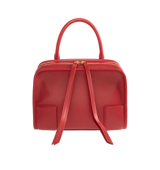 Image 2 of 5 - RED - Loewe Small Amazona 180 Bag in leather features a relaxed silhouette anchored by a single toron top handle, designed to be carried open, while a concealed closure secures the main compartment, three carry options: short handle, removable shoulder strap and crossbody, zip closure with two leather zip pullers, two compartments, main compartment closed with magnetic closure, internal flat pocket, left side d-ring for customization, nappa lambskin lining, and embossed double L branding. Lea