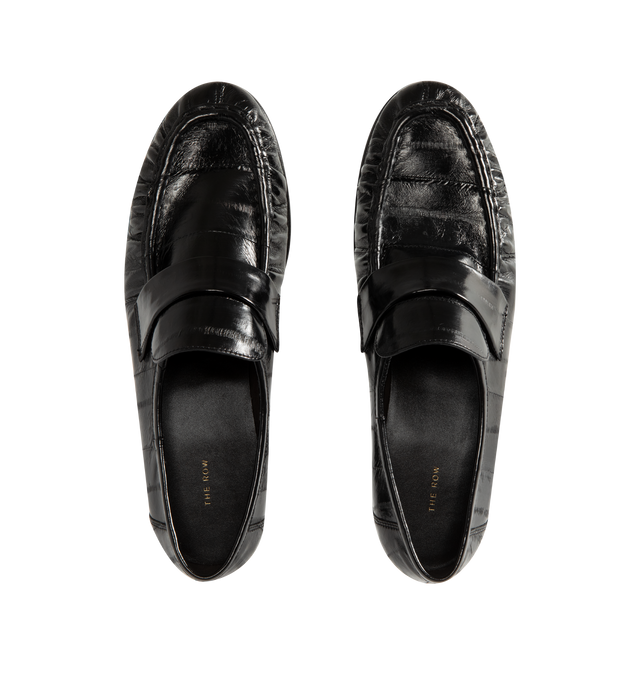 Image 4 of 4 - BLACK - THE ROW Soft loafer artisanally-crafted in polished eel skin leather with pleated outer vamp, curved front strap, hand-painted leather sole and sueded leater lining. 0.75 in. heel. Made in Italy.