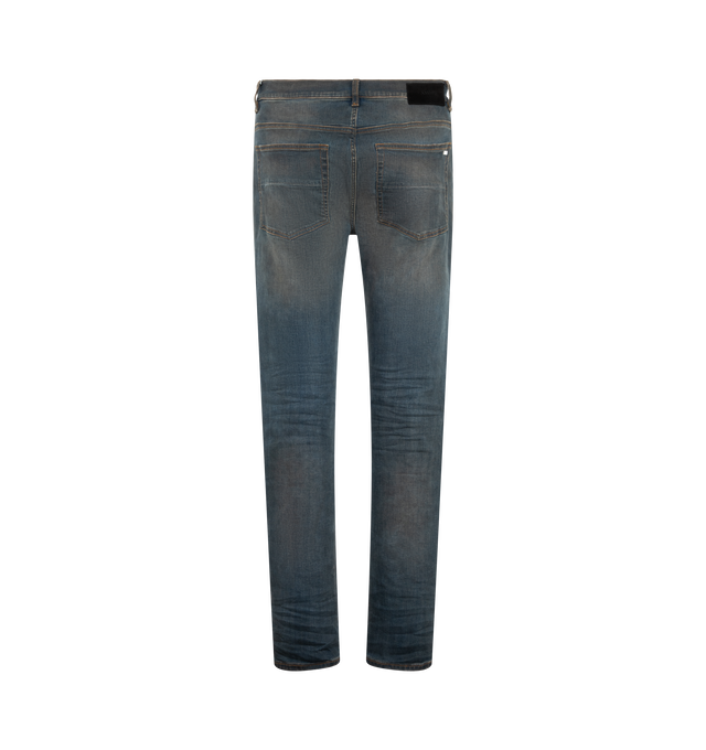 Image 2 of 3 - BLUE - Amiri Mens Ultrasuede MX1 Jeans are crafted from Italian stretch denim. Feature a slim fit, five-pocket styling, hand-distressed finish, pleated ultrasuede repair panels, button and zip closure, and signature MX1 construction. Main Material: 92% Cotton, 6% Elastomultiester, 2% Elastane. Made in USA.
